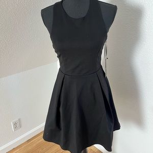 Black cocktail dress with cutouts